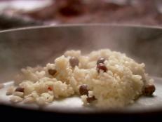 Cooking Channel serves up this Rice and Peas recipe from Nigella Lawson plus many other recipes at CookingChannelTV.com