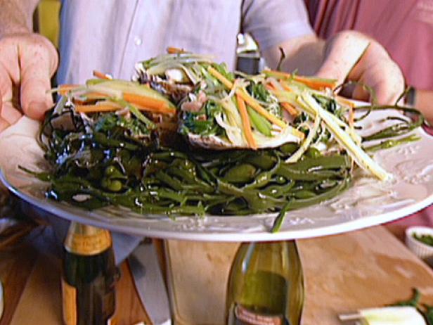 Poached Oysters In Champagne With A Julienne Of Vegetables Leaf Spinach And Prosciutto Ham Poached Oysters In Champagne With A Julienne Of Vegetables Leaf Spinach And Prosciutto Ham