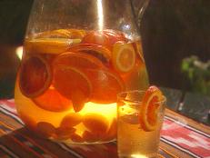 Cooking Channel serves up this White Wine California Citrus Sangria recipe from Michael Chiarello plus many other recipes at CookingChannelTV.com