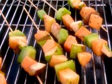 Cooking Channel serves up this Seasonal Fruit and Melon Kabobs with Fiery Chile Sauce recipe  plus many other recipes at CookingChannelTV.com