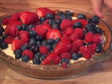 Cooking Channel serves up this Pudding and Berry Tart with Graham Cracker Crust recipe from Dave Lieberman plus many other recipes at CookingChannelTV.com