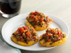 Cooking Channel serves up this Grilled Polenta Crackers with Roasted Pepper Salsa recipe from Rachael Ray plus many other recipes at CookingChannelTV.com