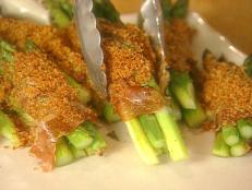 Cooking Channel serves up this Roasted Asparagus Bundles wrapped in Prosciutto with Seasoned Bread Crumbs recipe from Michael Chiarello plus many other recipes at CookingChannelTV.com