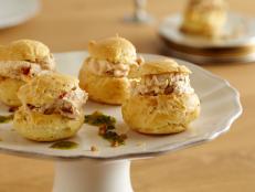 Cooking Channel serves up this Goat Cheese and Sun Dried Tomato Profiteroles with Herb Oil recipe from Giada De Laurentiis plus many other recipes at CookingChannelTV.com
