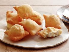 Cooking Channel serves up this Panzerotti di Ricotta e Mozzarella recipe from David Rocco plus many other recipes at CookingChannelTV.com