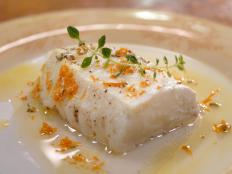 Cooking Channel serves up this Halibut Poached in Olive Oil recipe from Laura Calder plus many other recipes at CookingChannelTV.com
