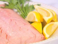 Cooking Channel serves up this Poached Salmon with Lemon Mint Tzatziki recipe from Ellie Krieger plus many other recipes at CookingChannelTV.com