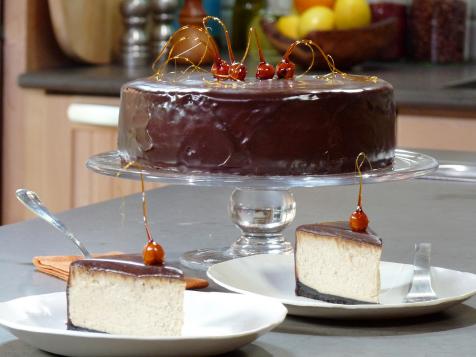 Chocolate Glazed Praline Cheesecake with Candied Hazelnuts