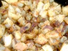 Cooking Channel serves up this Dutch Oven Potatoes recipe  plus many other recipes at CookingChannelTV.com