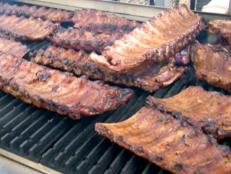 Learn how to barbecue with Cooking Channel's essential BBQ guide, including tips, advice, ideas, recipes, explaining different styles and more.