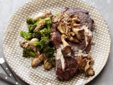 Cooking Channel serves up this Grilled Rib Eyes with Sauteed Broccoli and Oysters recipe from Chuck Hughes plus many other recipes at CookingChannelTV.com