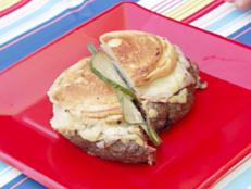 Cooking Channel serves up this Pressed Cuban-Style Burger recipe from Bobby Flay plus many other recipes at CookingChannelTV.com