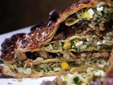 Cooking Channel serves up this Pirog Boyarskiy (Nobleman's Pie) recipe  plus many other recipes at CookingChannelTV.com