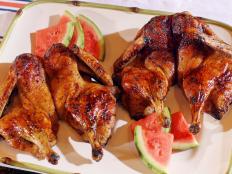 Elizabeth Karmel's Butterflied Grilled Duck w/ Spicy Watermelon Glaze as she and Roger Mooking cook at the Michelson home in Lockhart, TX, as seen on Cooking Channel's Red, White, and Grill special featuring Williams-Sonoma.