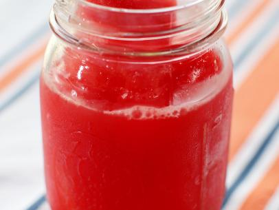 Elizabeth Karmel's Spiked Watermelon Agua Fresca as she and Roger Mooking cook at the Michelson home in Lockhart, TX, as seen on Cooking Channel's Red, White, and Grill special featuring Williams-Sonoma.
