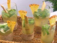 Cooking Channel serves up this Pineapple Mojitos recipe from Ingrid Hoffmann plus many other recipes at CookingChannelTV.com