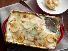Cooking Channel serves up this Bacon Potatoes Au Gratin recipe  plus many other recipes at CookingChannelTV.com