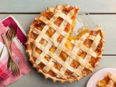 Cooking Channel serves up this Lattice-Top Georgia Peach Pie recipe  plus many other recipes at CookingChannelTV.com