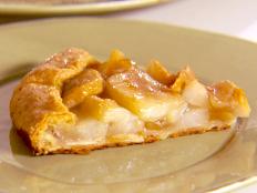 Cooking Channel serves up this Rustic Pear Tart recipe from Ellie Krieger plus many other recipes at CookingChannelTV.com