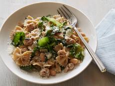 Cooking Channel serves up this Pasta with Escarole, White Beans and Chicken Sausage recipe from Ellie Krieger plus many other recipes at CookingChannelTV.com