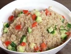 Cooking Channel serves up this Cucumber-Bell Pepper Quinoa recipe from Aida Mollenkamp plus many other recipes at CookingChannelTV.com