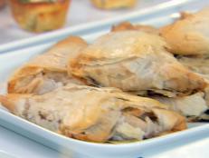 Cooking Channel serves up this Apple Cranberry Phyllo Turnovers recipe from Ellie Krieger plus many other recipes at CookingChannelTV.com