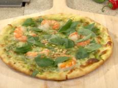 Cooking Channel serves up this Grilled Shrimp and Cilantro Pesto Pizza recipe from Bobby Flay plus many other recipes at CookingChannelTV.com