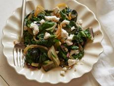 Cooking Channel serves up this Wilted Greens with Ricotta Salata recipe from Giada De Laurentiis plus many other recipes at CookingChannelTV.com