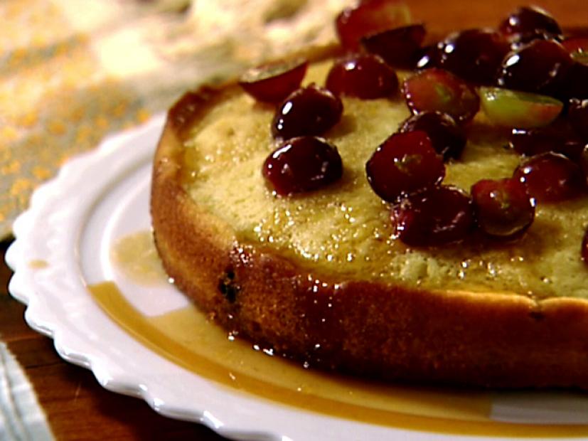A warm olive oil and grape cake is served for dessert.