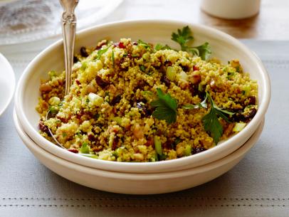 CURRIED COUSCOUS SALAD WITH DRIED SWEET CRANBERRIES
Dave Lieberman
Cooking Channel
Instant Couscous, Sweetened Dried Cranberries, Salt, Curry Powder, Salt, Sugar, Orange,
Olive Oil, Scallions, Parsley, Lemon, Walnuts