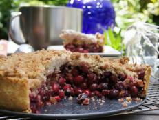 Cooking Channel serves up this Cranberry Tangerine and Candied Ginger Tart with Cardamom Crumbles recipe  plus many other recipes at CookingChannelTV.com