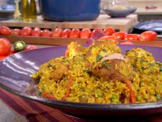 Cooking Channel serves up this Adobo Seasoned Chicken and Rice recipe from Bobby Flay plus many other recipes at CookingChannelTV.com
