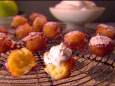 Cooking Channel serves up this Apple Zeppole with Cinnamon Whipped Cream recipe from Giada De Laurentiis plus many other recipes at CookingChannelTV.com