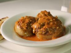 Cooking Channel serves up this Sogan Dolma (Stuffed Onions) recipe  plus many other recipes at CookingChannelTV.com