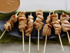 Cooking Channel serves up this Chicken Sate with Spicy Peanut Dipping Sauce recipe from Ellie Krieger plus many other recipes at CookingChannelTV.com