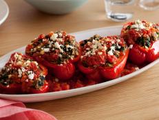 Cooking Channel serves up this Greek-Style Stuffed Peppers recipe from Ellie Krieger plus many other recipes at CookingChannelTV.com