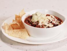 Cooking Channel serves up this Black Bean and Beef Chili with Green Sour Cream recipe from Rachael Ray plus many other recipes at CookingChannelTV.com