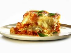 Cooking Channel serves up this Lasagna with Roasted Eggplant-Ricotta Filling recipe from Rachael Ray plus many other recipes at CookingChannelTV.com