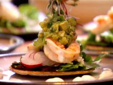 Cooking Channel serves up this Olive Oil Poached Shrimp with Olive Tortillas, Cumin Scented Black Beans and Tomatillo Avocado Salsa recipe from Lynn Crawford plus many other recipes at CookingChannelTV.com