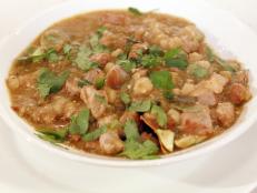 Cooking Channel serves up this Pork Tenderloin Posole with Bottom of the Bowl Nacho Surprise recipe from Rachael Ray plus many other recipes at CookingChannelTV.com