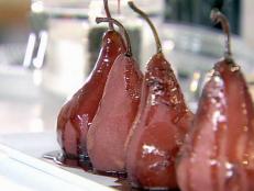 Cooking Channel serves up this Spiced Red Wine-Poached Pears recipe from Ellie Krieger plus many other recipes at CookingChannelTV.com