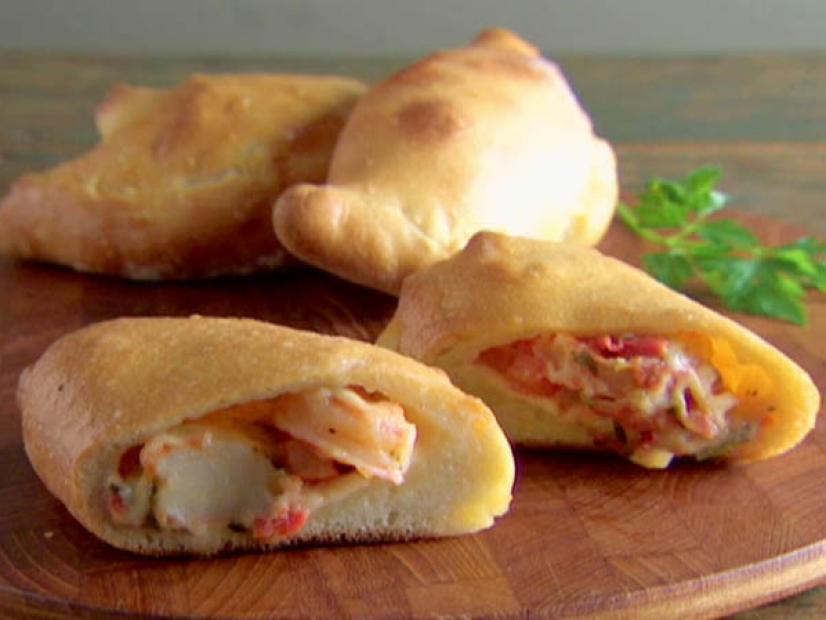 Calzones filled with cheese and meat mixture, prepared by Giada de Laurentiis. 