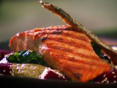 Cooking Channel serves up this Tahini Grilled Salmon with Sauteed Spinach, Beets with Sesame Seeds, Eggplant Puree and Tahini Sauce recipe from Roger Mooking plus many other recipes at CookingChannelTV.com
