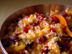Cooking Channel serves up this Sweet Couscous with Nuts and Dried Fruit recipe from Giada De Laurentiis plus many other recipes at CookingChannelTV.com