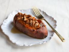 Cooking Channel serves up this Stuffed Sweet Potatoes with Sweet and Spicy Walnuts recipe  plus many other recipes at CookingChannelTV.com