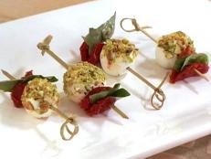 Cooking Channel serves up this Sun-Dried Tomato and Goat Cheese Skewers recipe from Brian Boitano plus many other recipes at CookingChannelTV.com