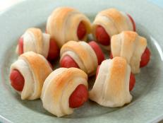 Cooking Channel serves up this De-Pudged Pigs in a Blanket recipe from Lisa Lillien plus many other recipes at CookingChannelTV.com