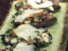 Cooking Channel serves up this Portobello Stuffed with Sausage, Spinach and Smoked Mozzarella recipe from Bobby Flay plus many other recipes at CookingChannelTV.com