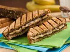Cooking Channel serves up this Grilled Banana and Nutella Panini recipe from Bobby Flay plus many other recipes at CookingChannelTV.com