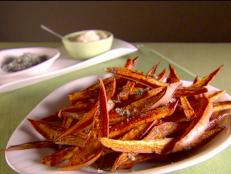 Cooking Channel serves up this Sweet Potato Fries with Basil Salt and Garlic Mayonnaise recipe from Giada De Laurentiis plus many other recipes at CookingChannelTV.com